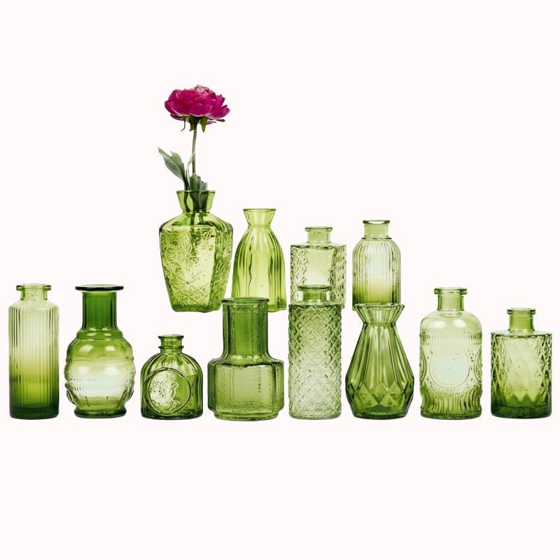 סט 12 אגרטלי זכוכית ירוקה 1