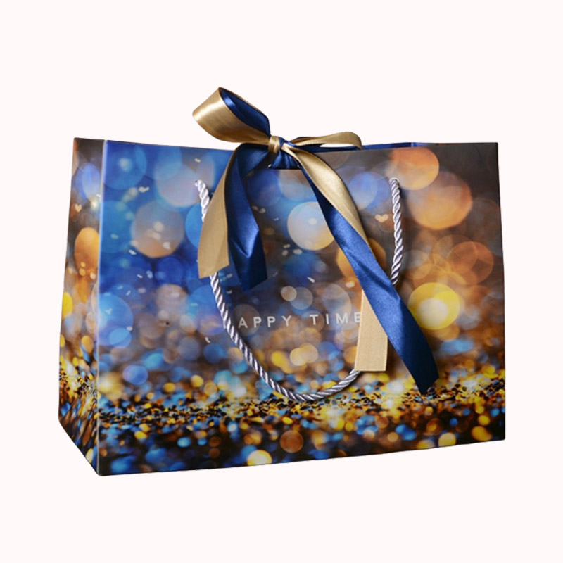 שקיות קרטון מודפס עם קשירת פפיון סרט סאטן - 25 יח -12*25*36 1